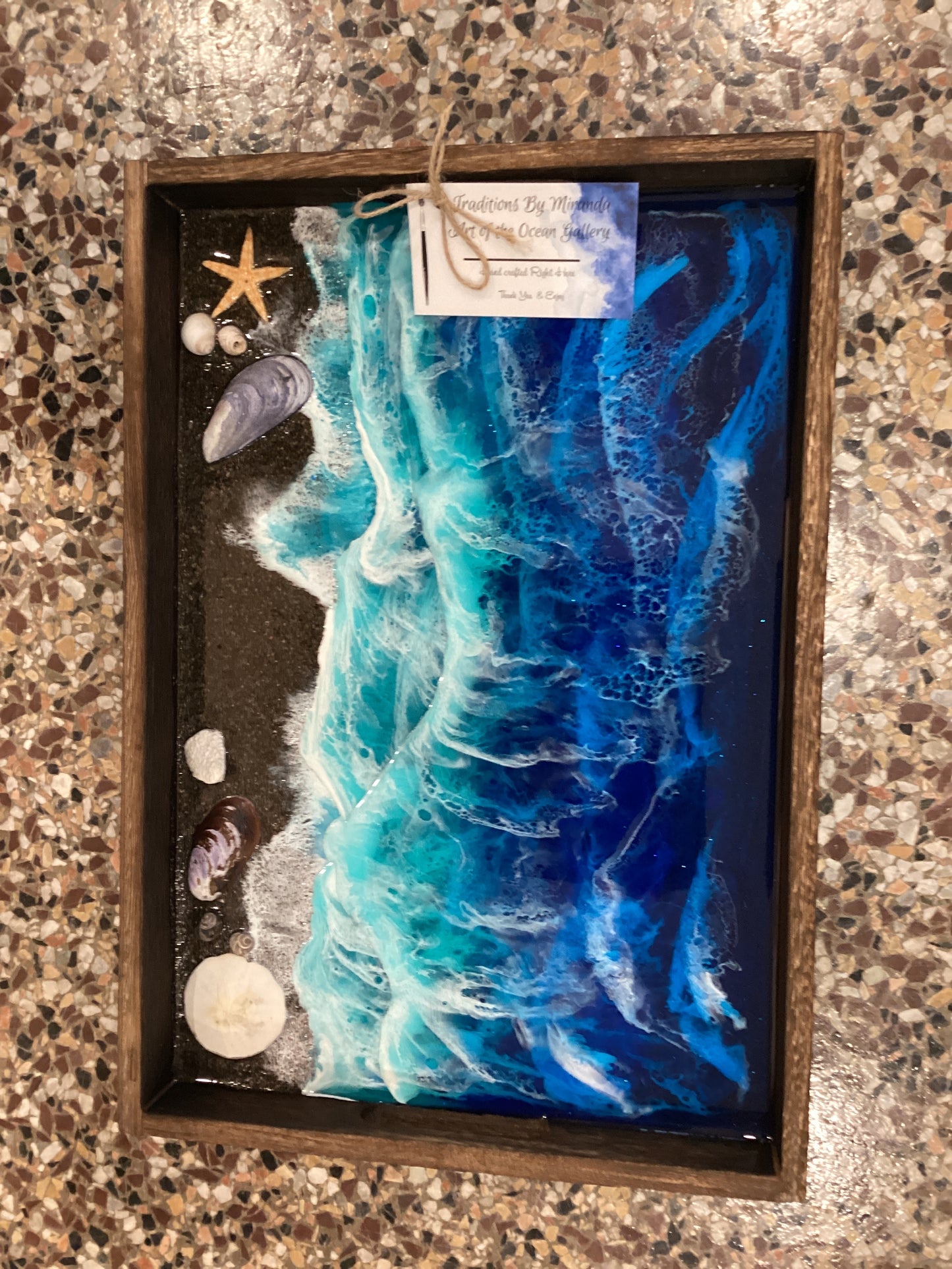 Rectangular wave tray with authentic starfish, shells, and muscle shells. Authentic Rocky Harbour sand in this beautiful cobalt and seafoam green resin.