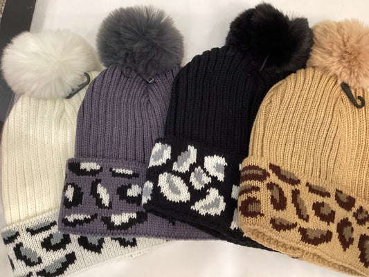 Winter hat with leopard design and pom-pom