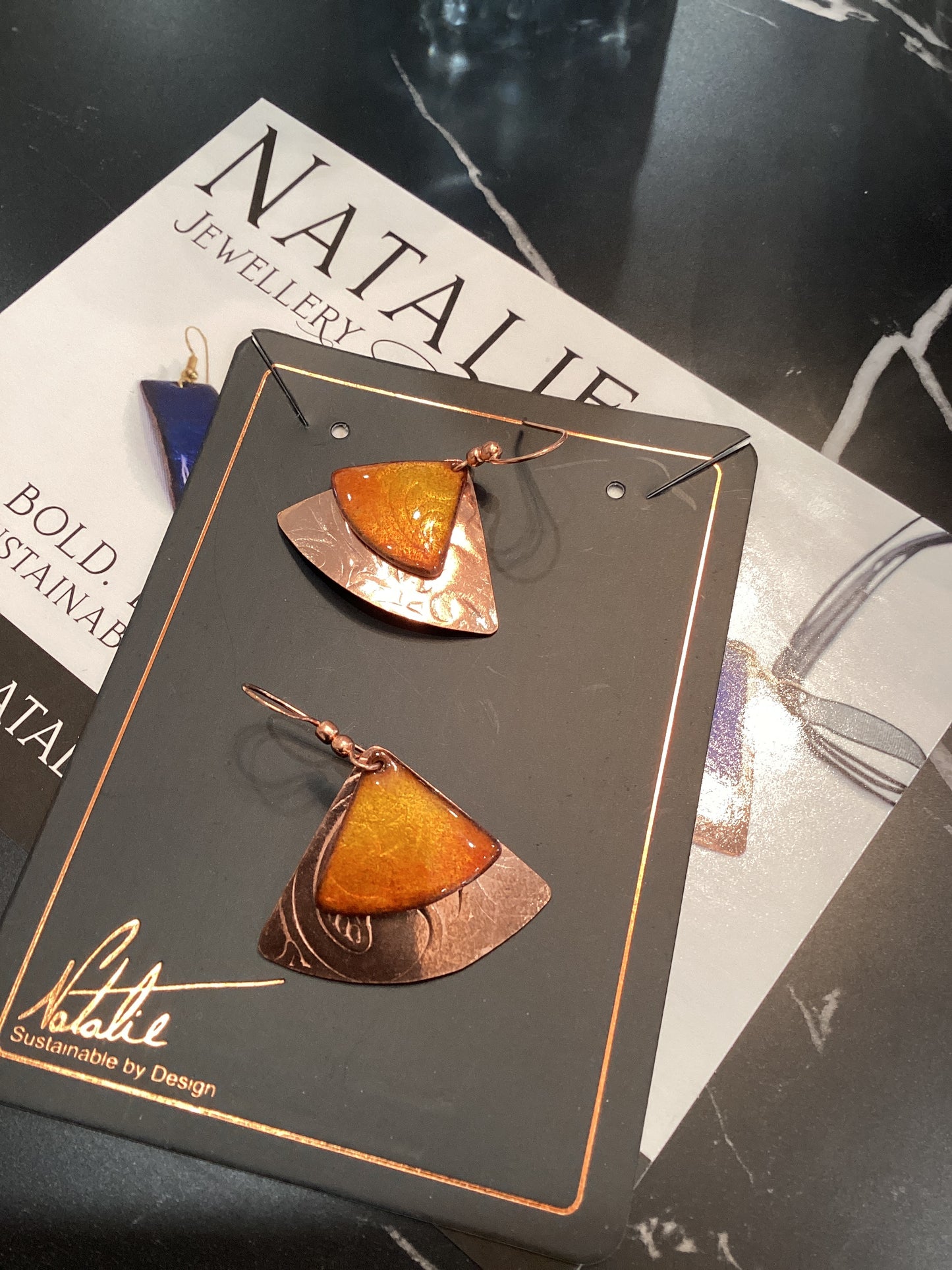 Natalie jewellery triangle with copper